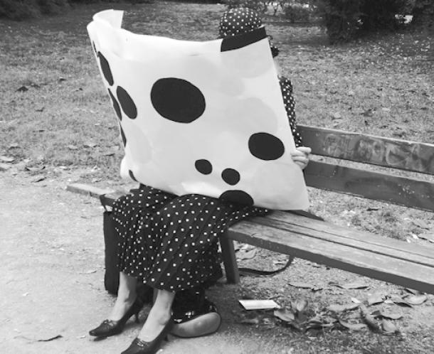Polka dot portrait on bench